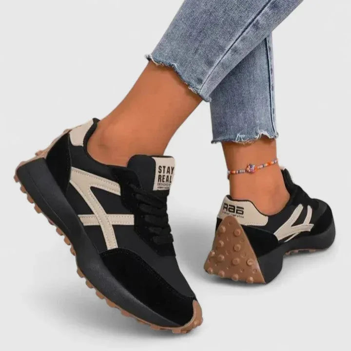 Orthopaedic trainers with arch support and non-slip sole