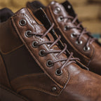 Work boots with reinforced panels and padded interior